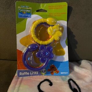 Sesame Street Yellow and Purple Rattle Links vintage 2014